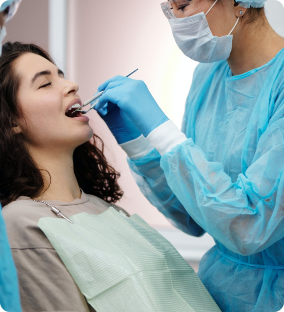 Dentist checking a patient with dental kit